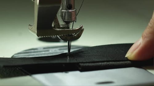 Sewing Machine Stitching Black Material Close Up