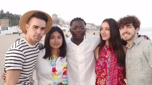 Friends Smiling on Sandy Beach Vacation