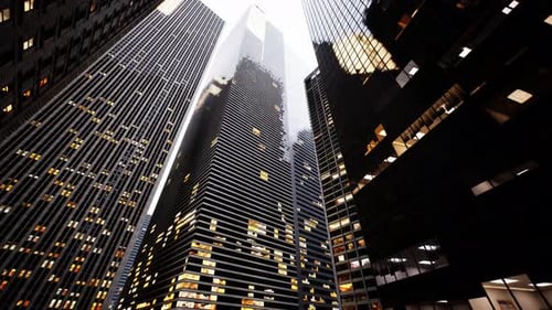 Un impresionante horizonte de edificios urbanos iluminados por la noche