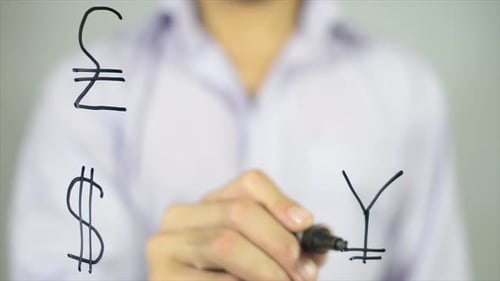 Hand Writes Currency Symbols on Clear Surface
