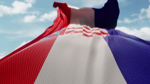Realistic Waving Croatia Flag on Blue Sky Background