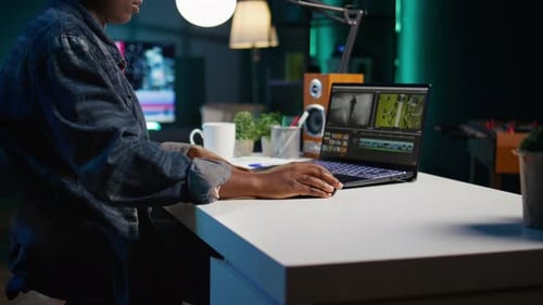 Post Production Studio Employee Working with Raw Footage