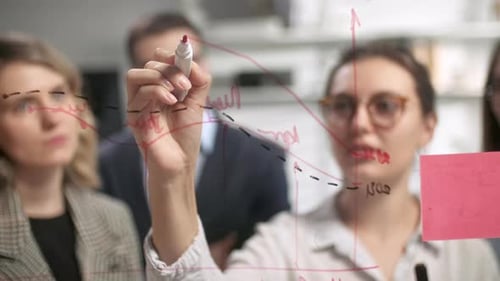 Team Collaborating on a Project in Modern Office