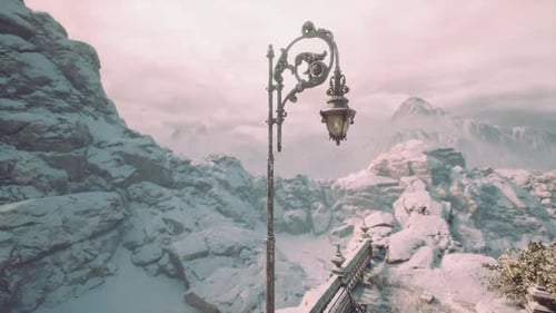 Snow Covered Mountains with Vintage Street Lamp in Winter Landscape