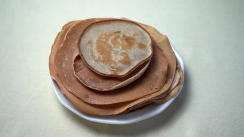 Stack of Pancakes on a Plate