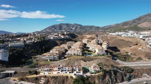 City beneath the mountains: atmospheric scenery in the heart of nature, Spain