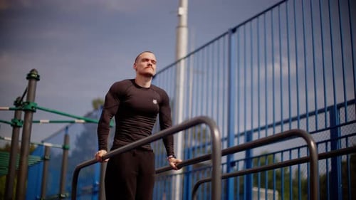 Slowmotion Calisthenics Routine on Outdoor Parallel Bars