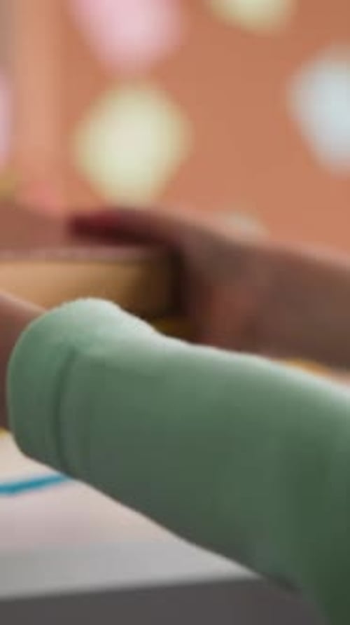 Stack of colorful books on desk