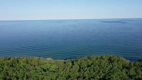 Village with Hotels and Inns on Cliff with Vegetation Above the Black Sea Against a Clear Sky