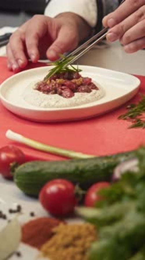 Process of Creating Highclass Dish By Professional Chef in Restaurant Kitchen Using Meat Vegetables