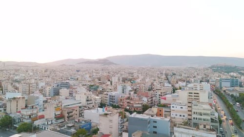 Aerial Panorama of Athens at Sunset Highlighting Urban Landscape