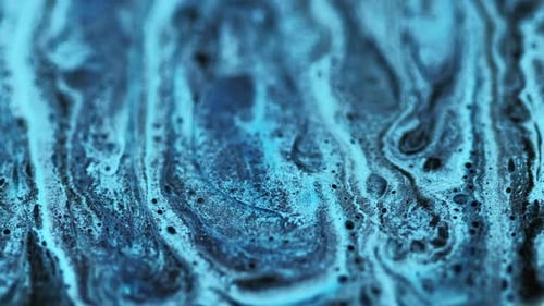 Blue and Black Swirling Marbling Abstract Texture