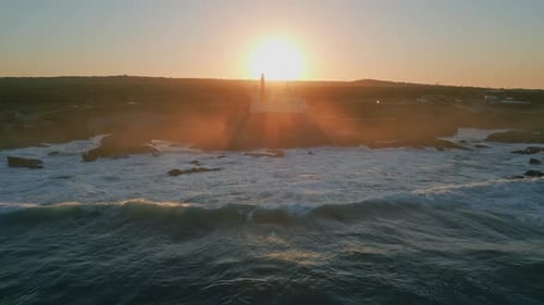 Silhouette Lighthouse Summer Sunset Drone View Foamy Ocean Water Splashing