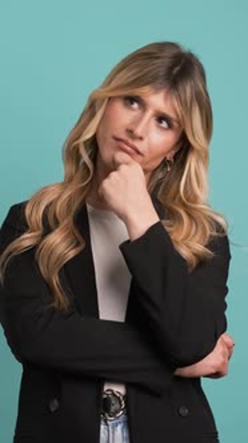 Woman Had Idea Smiling and Raising Index Finger