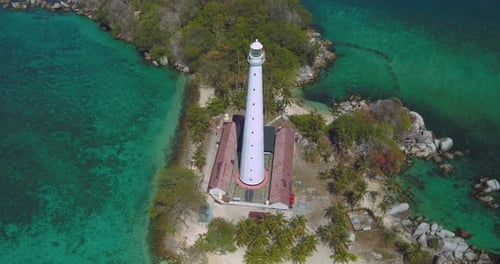 Granite Island Coast Surrounded by Clear Tropical Water Aerial