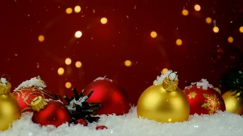 Christmas Ornaments and Snow with Bokeh Background