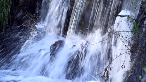 A small waterfall of transparent water, in Pomar - Castelo Branco, Portugal