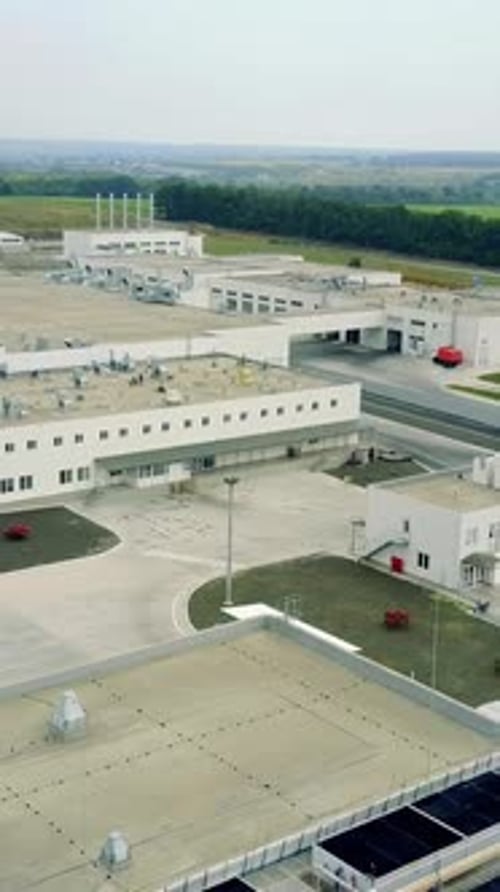 Modern Factory Exterior. Aerial view of newly constructed distribution center