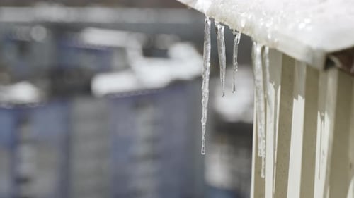 Dangerous Phenomenon During Thaw From Falling Icicles From Buildings