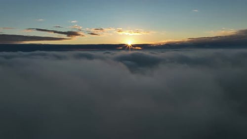Aerial View of Clouds at Sunset