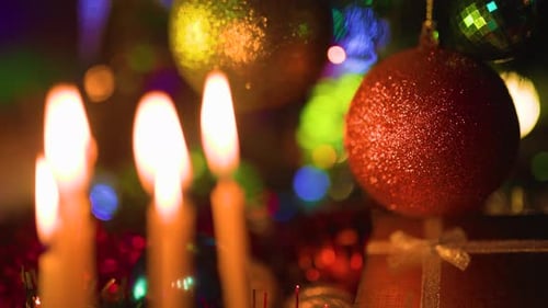 Festive Christmas Candles with Colorful Decorations