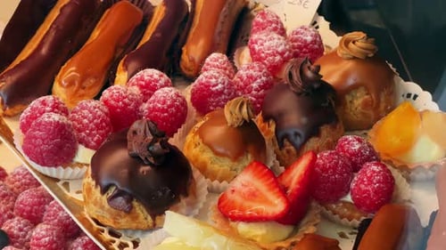 Freshly Baked Desserts and Various Gourmet Bake for Sale in Parisian Bakery Close Up Traditional