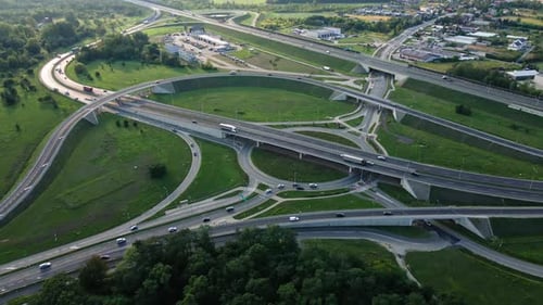 Cars Moving on Transport Road Junction in City Aerial View