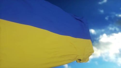 Beautiful Waving Ukrainian Flag against Blue Sky
