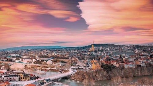 Tbilisi Georgia City During Sunset And Night Illuminations Unusual Cloudy Effects Sky Elevated Top