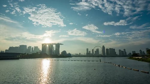 Singapore Central Business District seen from Marina bay transform from dusk to night time-lapse.