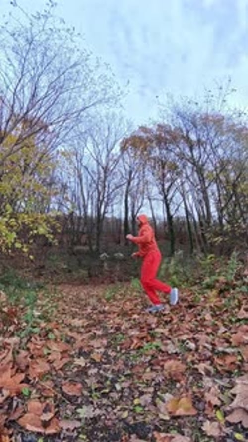 Woman Jumps and Does the Splits in the Woods