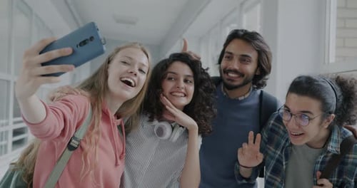 Slow Motion of Happy Girls and Guys High School Students Taking Selfie with Smartphone Camera Posing