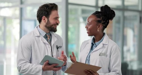 Meeting, clipboard and doctors on tablet in hospital for diagnosis, consulting and advice