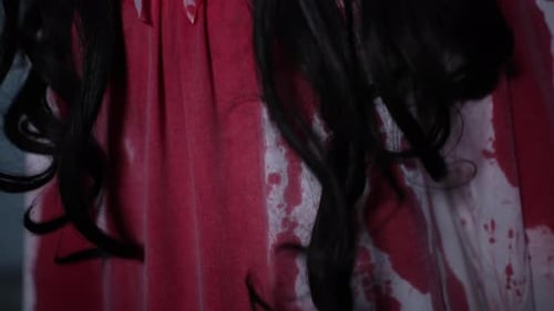 Scary Woman with White Eyes Stares Intensely