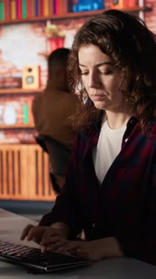 Vertical Video Portrait of Upbeat Programmer Coding Advanced AI Algorithm in Startup