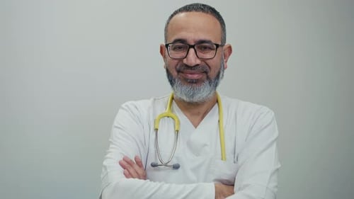 Smiling Doctor in White Coat with Stethoscope