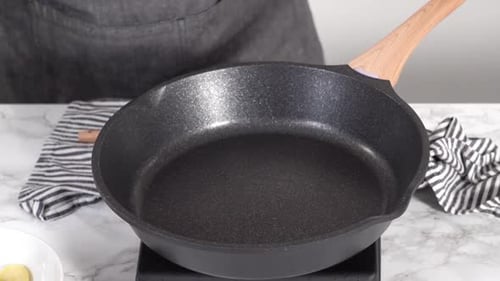 Time Lapse Step By Step Frying Mini Pancake Cereal in a Nonstick Frying Pan