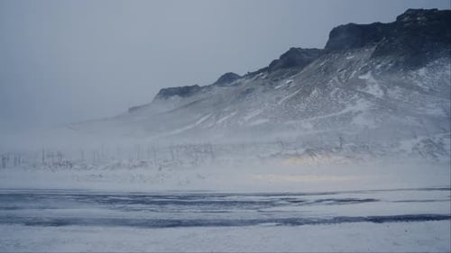 Snow Storm Over Road And Mountains, Vik