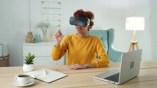 Woman Using Virtual Reality Headset at Home