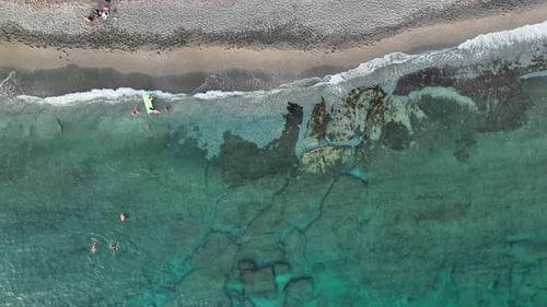 People Swim in the Sea Aerial View 4 K