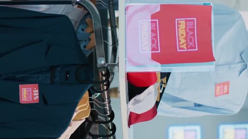 Vertical Video Seasonal Sales Labels in Clothing Store