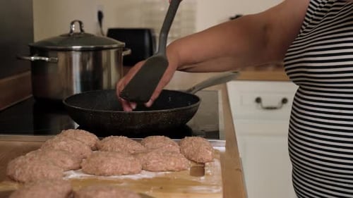 Placing Raw Cutlet Into Frying Pan Unrecognizable Person Cooking Minced Meat Patty Putting Ground