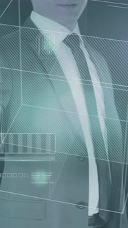 A Man Works with Data on a Virtual Panel