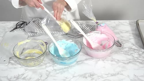 Step By Step Mixing Food Coloring Into the Meringue to Bake Unicorn Meringue Cookies