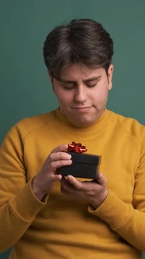 Young Adult Holding a Birthday Gift