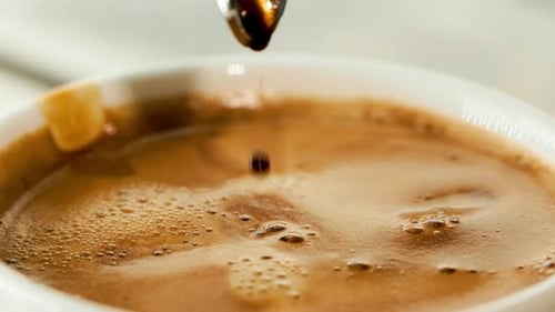 Coffee Pouring into Mug Close Up Shot