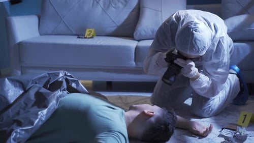 Forensic Investigator Documents Crime Scene at Night