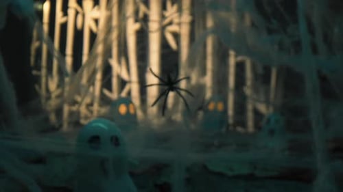 Spooky Halloween Decorations with Ghosts and Spiders