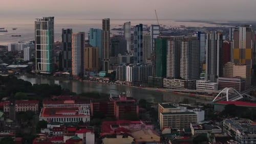 High Angle View of Buildings in City Tilt Up Reveal of High Rise Apartment or Office Towers in