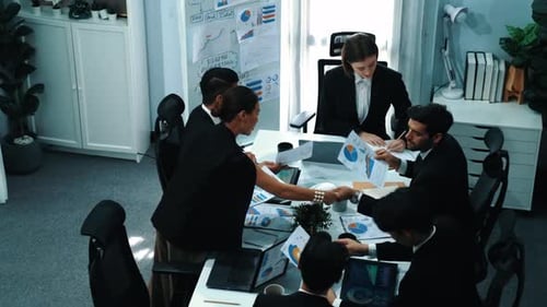 Top view of skilled businesspeople working together at meeting. Directorate.